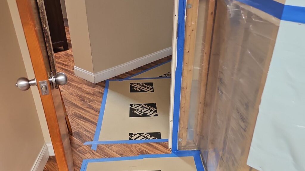 Floor protection and containment during cleanup in Cocoa, FL – Affordable Water and Mold Removal job photo