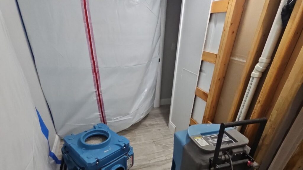Water damage restoration containment and dehumidifier in Cocoa, FL – Affordable Water and Mold Removal job photo