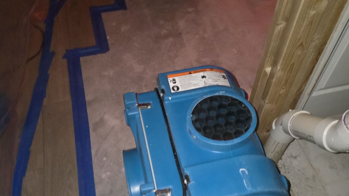 Slow drain pipe leak water damage behind a pantry in West Melbourne, FL – Affordable Water and Mold Removal job photo